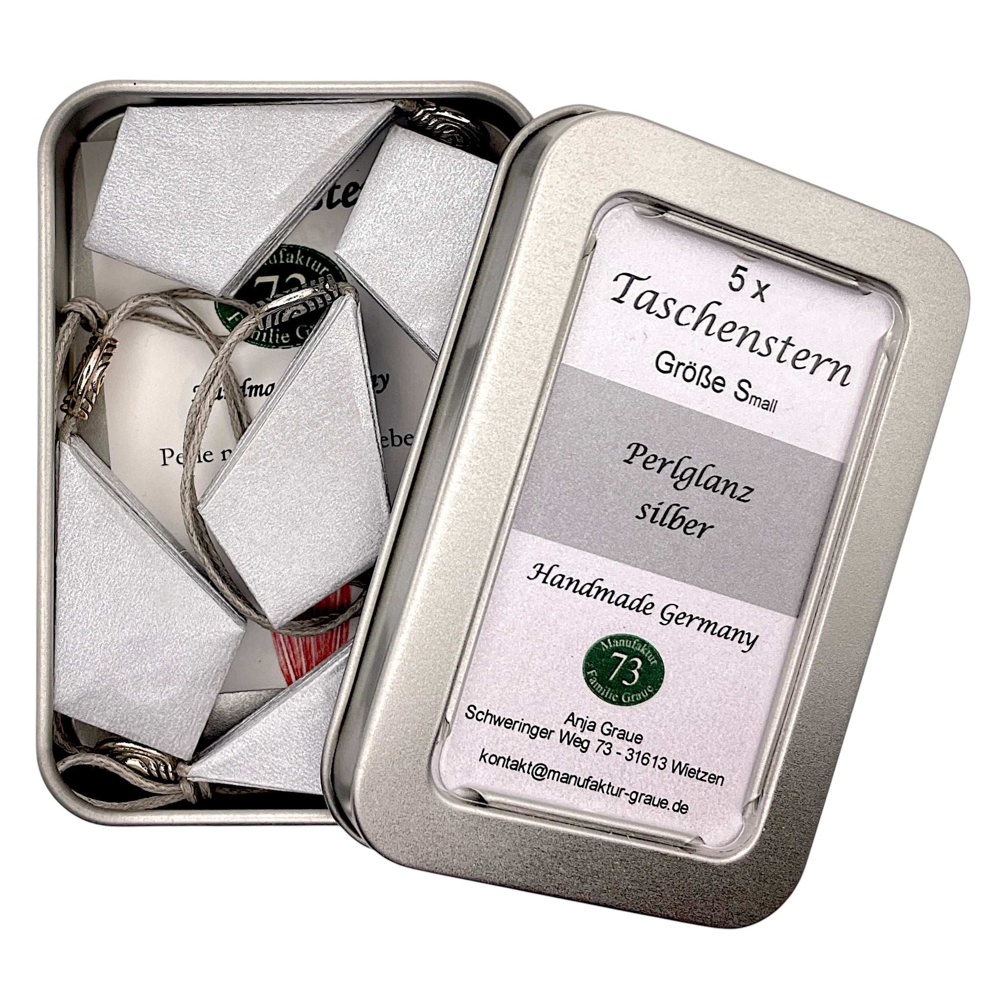 Handgefalteter Papierstern Mini in Silber aus hochwertigem Metallicpapier mit elegantem Glanz.