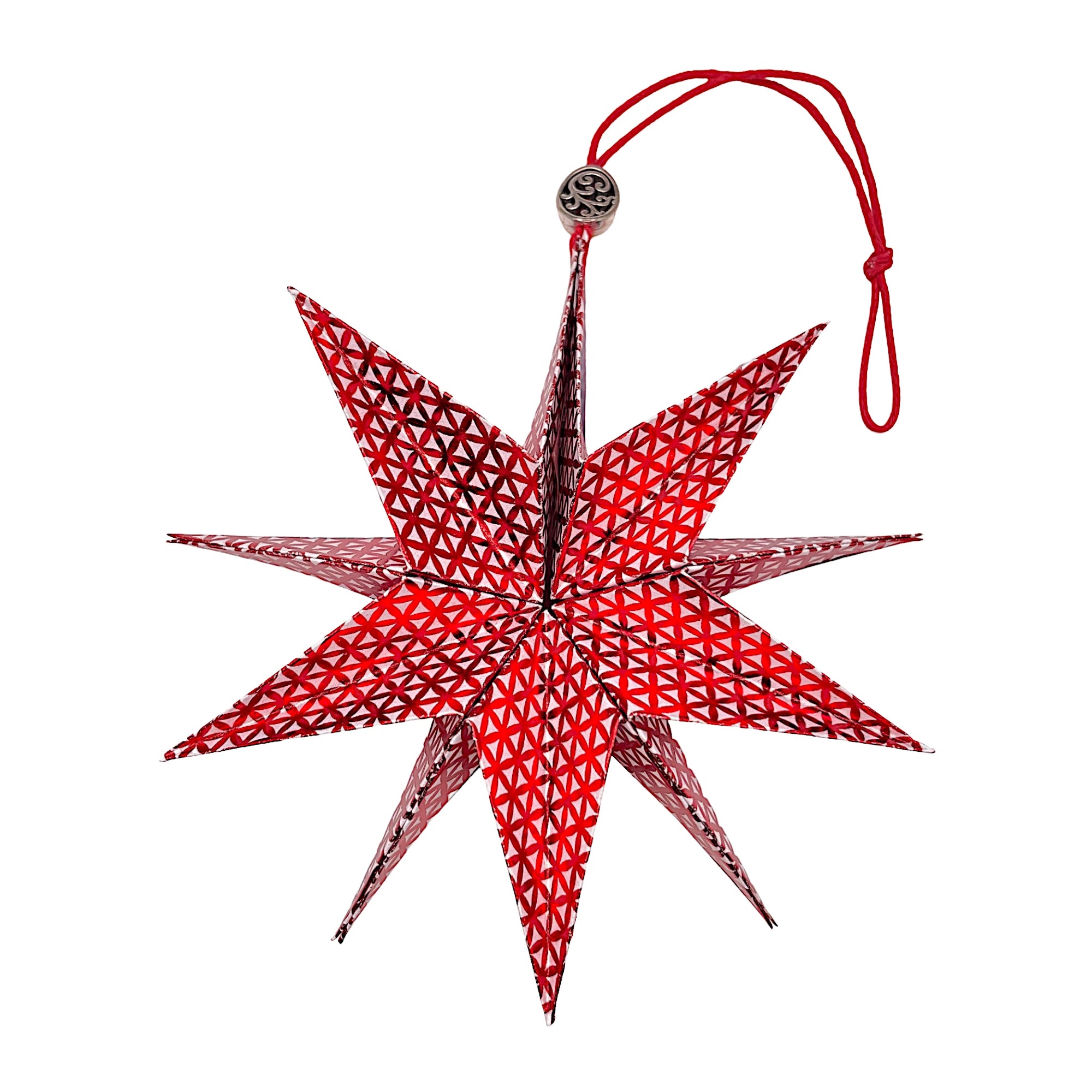 Faltstern aus glänzendem Rot mit feinem weißen Muster – kunstvoll entfaltet