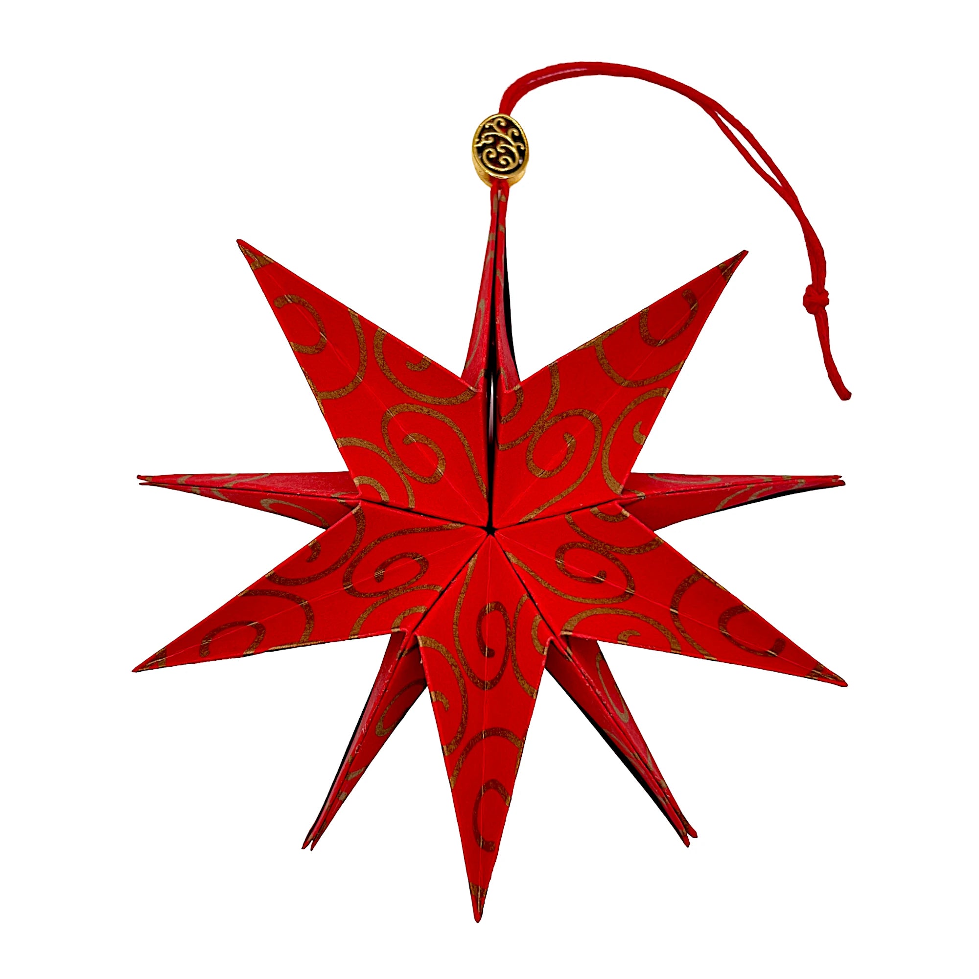Papierstern aus rotem Papier mit goldener Arabeske – kunstvoll entfaltet mit edlem Glanz
