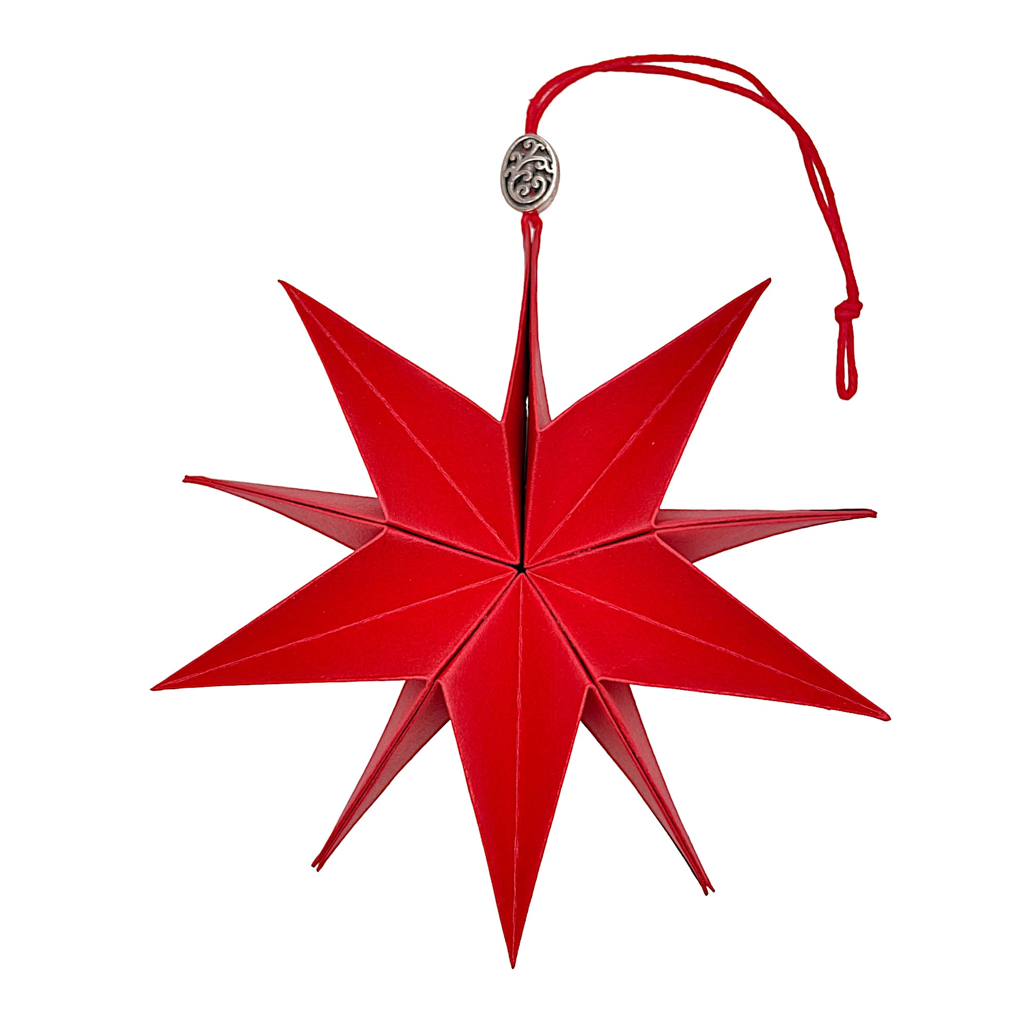 Papierstern aus rotem Perlglanzpapier, kunstvoll entfaltet mit edlem Schimmer