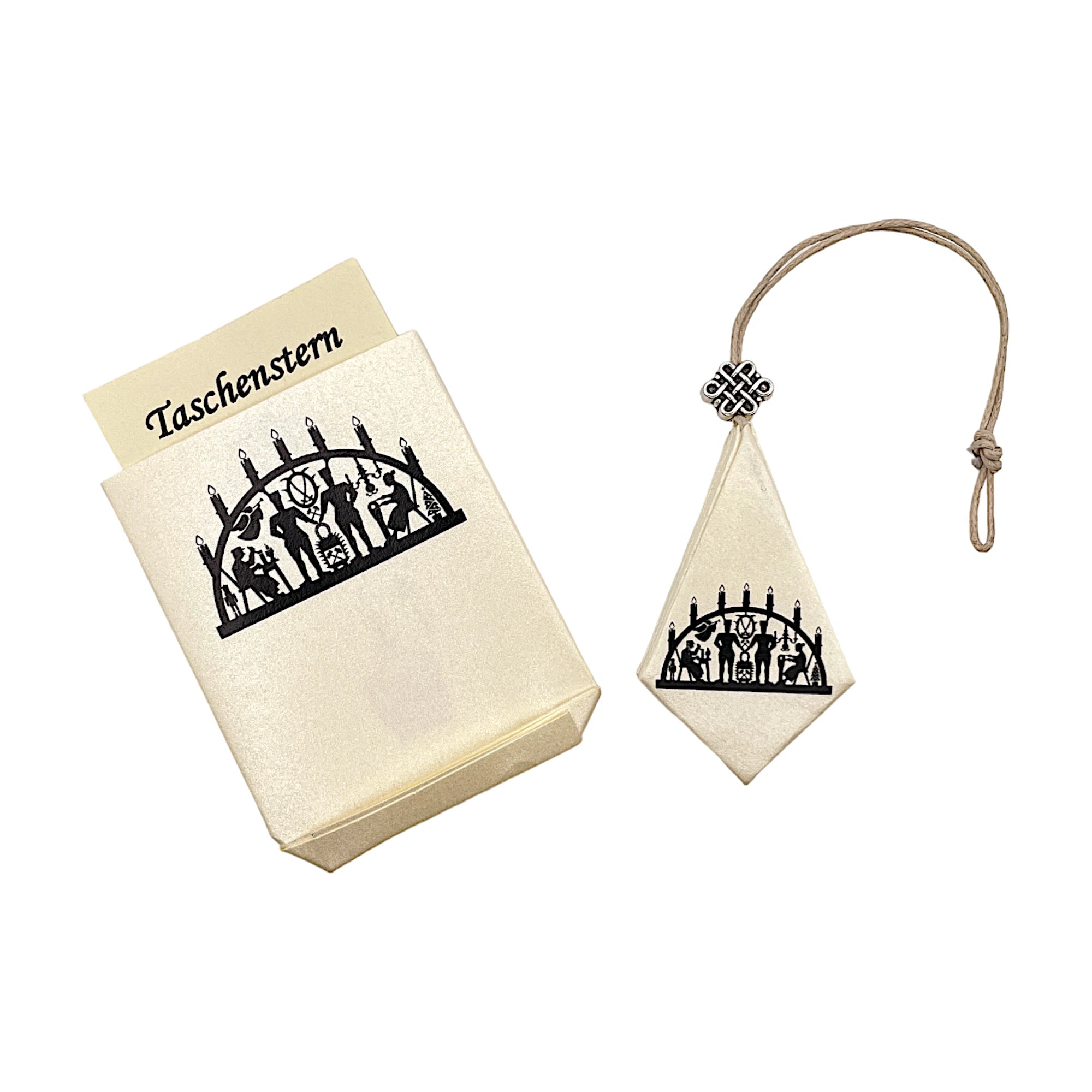 Zusammengelegter Papierstern mit Schwibbogen-Design, sicher im Etui verstaut