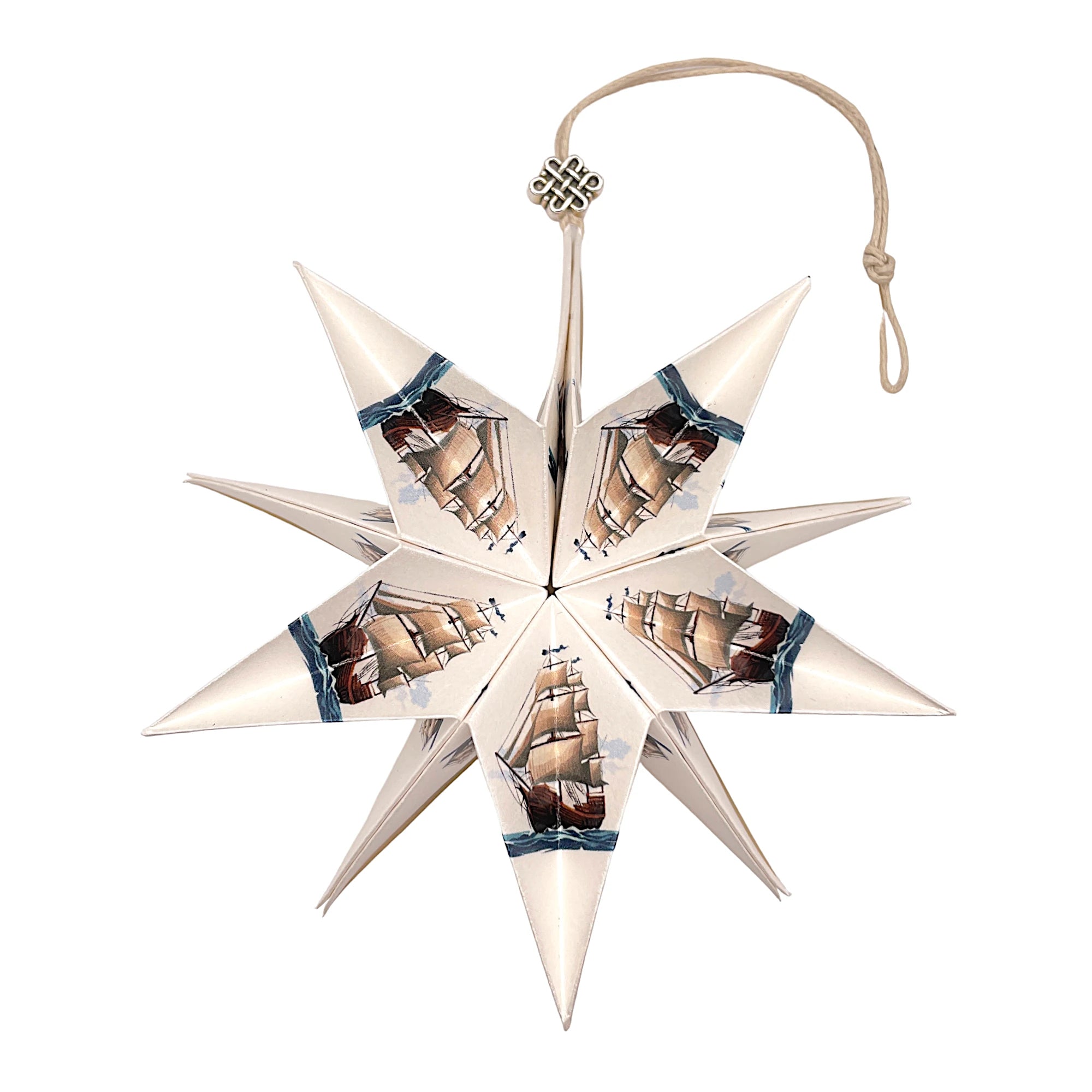 Papierstern mit Segelboot-Motiv, kunstvoll gefaltet und maritim gestaltet