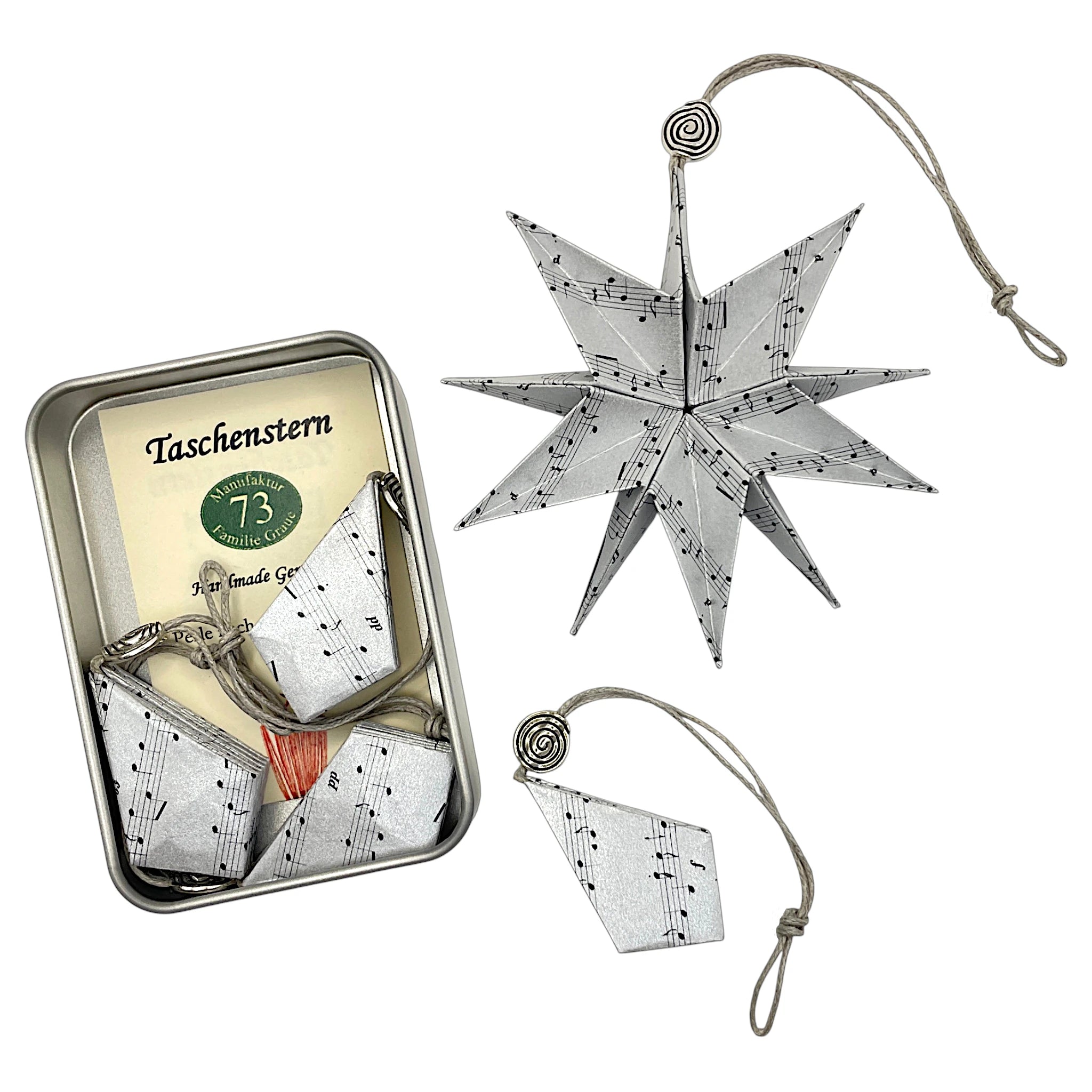 Weihnachtsstern in Silber mit Noten – kleiner handgefalteter Papierstern