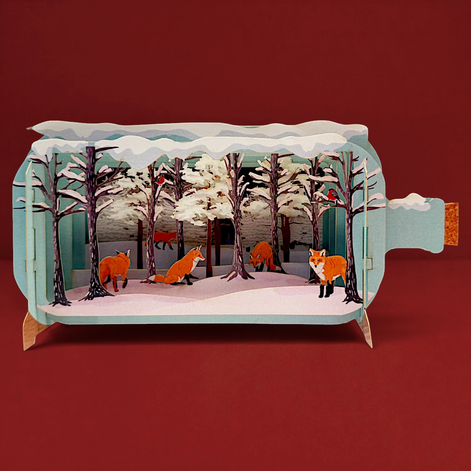 3D Pop-up Karte mit mehreren Füchsen in einer liebevoll gestalteten Waldszene.