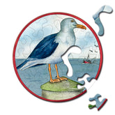 Gelegtes Curiosi Puzzle mit Möwenmotiv und außergewöhnlicher Puzzleteilform.