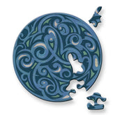 Gelegtes Curiosi Puzzle mit Windmotiv und außergewöhnlicher Puzzleteilform.