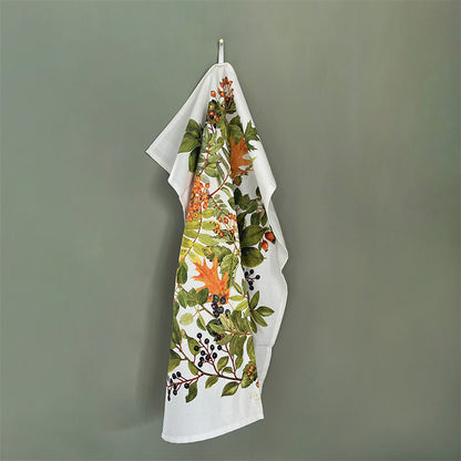 Geschirrtuch aus Bio-Baumwolle mit herbstlichen Blättern und Naturmotiven für die Küche.