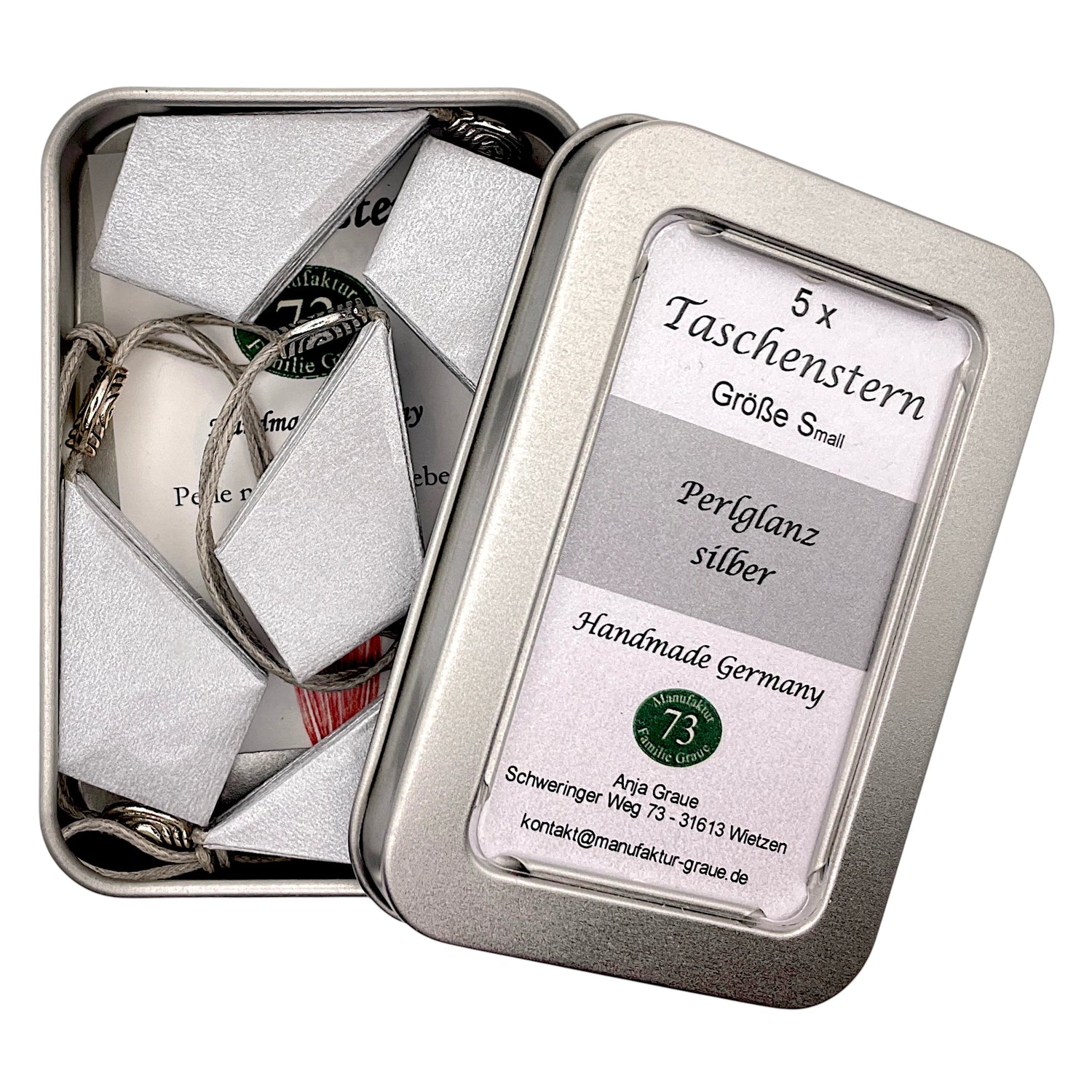 Handgefalteter Papierstern Mini in Silber aus hochwertigem Metallicpapier mit elegantem Glanz.