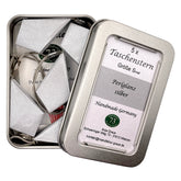 Handgefalteter Papierstern Mini in Silber aus hochwertigem Metallicpapier mit elegantem Glanz.