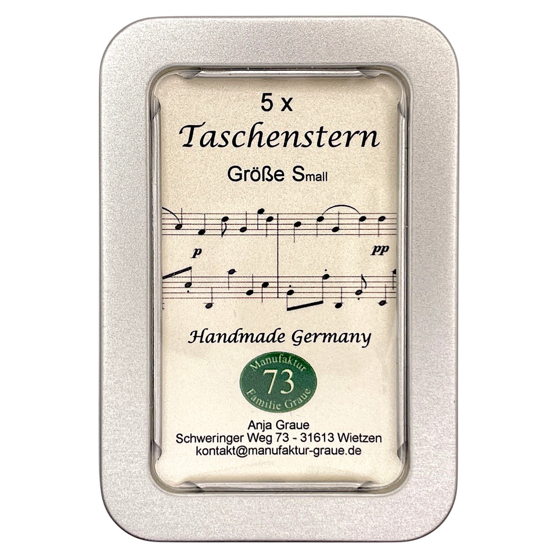 Papierstern mit Notenmotiv zusammengefaltet im Etui – besondere Geschenkidee für Weihnachten.