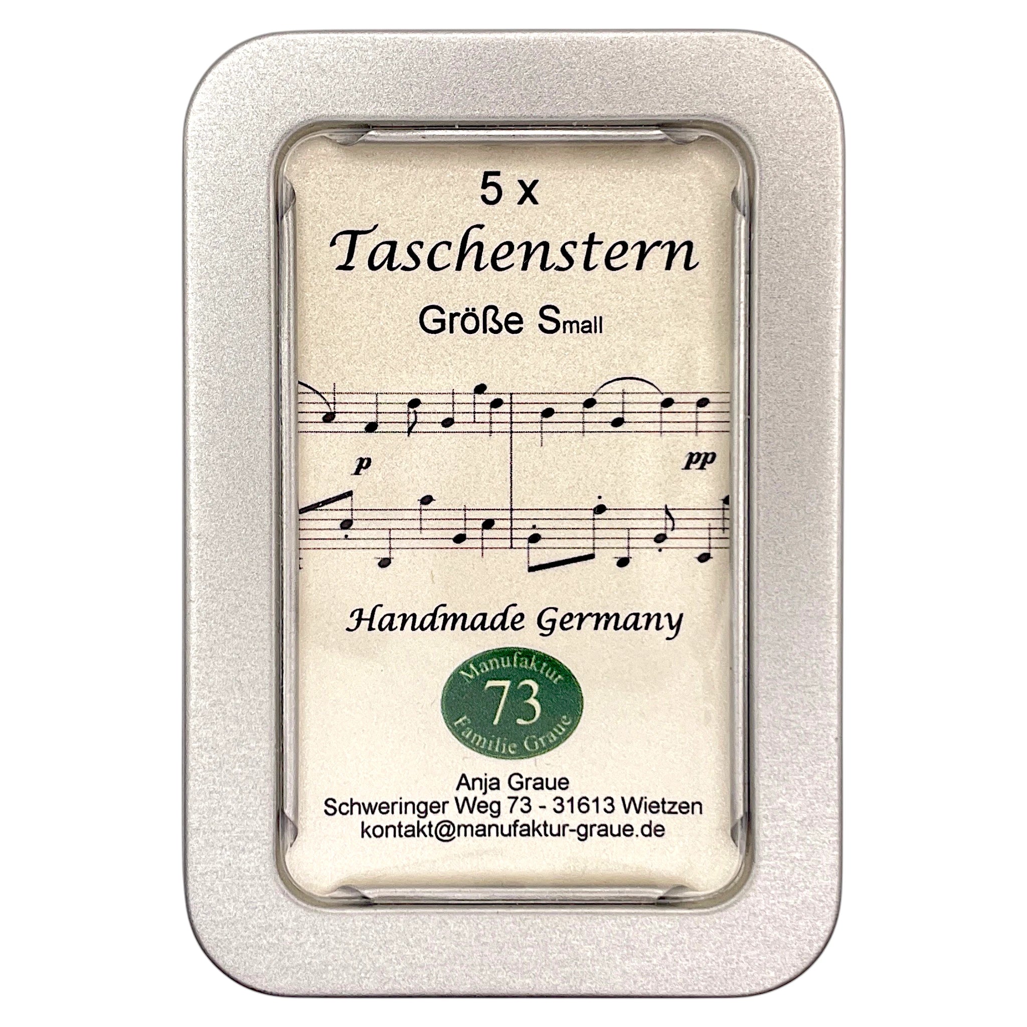 Papierstern mit Notenmotiv zusammengefaltet im Etui – besondere Geschenkidee für Weihnachten.