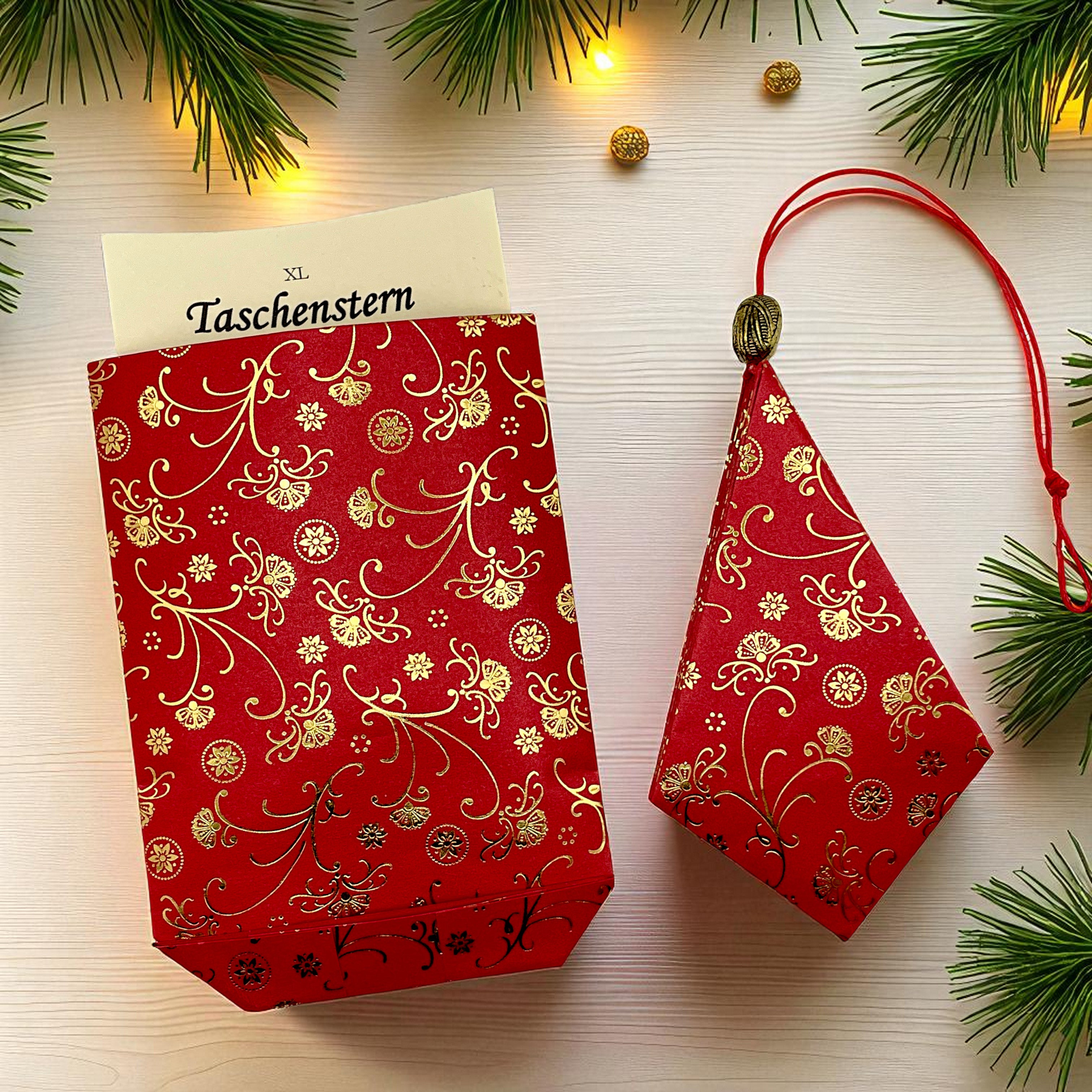Stern aus Papier in rot und gold auf einem Tisch