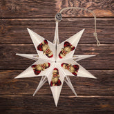 Fensterstern mit Weihnachtsmann von Manufaktur Graue – handgefertigter Papierstern für Adventszeit, Weihnachtsdeko und festliche Wohnräume.