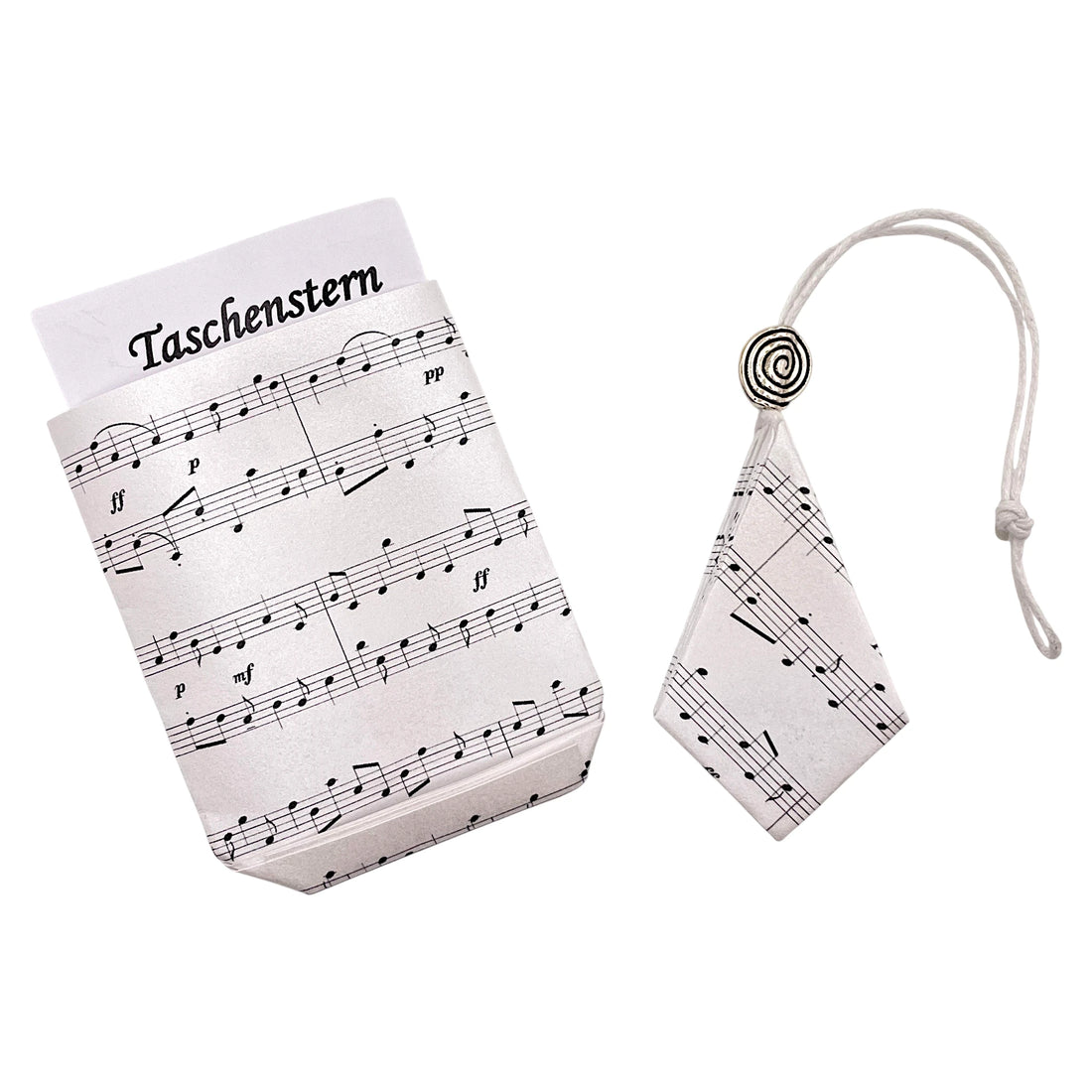 Handgefalteter Papierstern in Silberweiß als dekorativer Taschenstern für Weihnachten und festliche Dekoration.