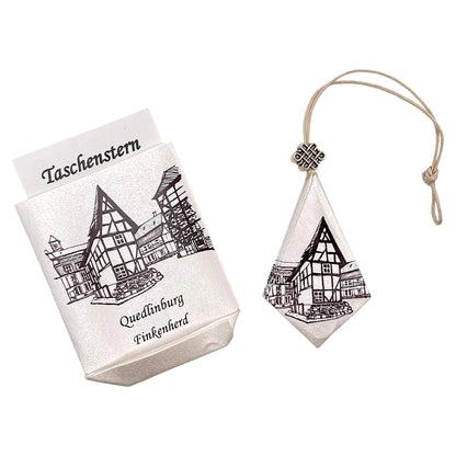 Handgefalteter Papierstern mit Motiv aus Quedlinburg – festliche Weihnachtsdekoration aus Papier.