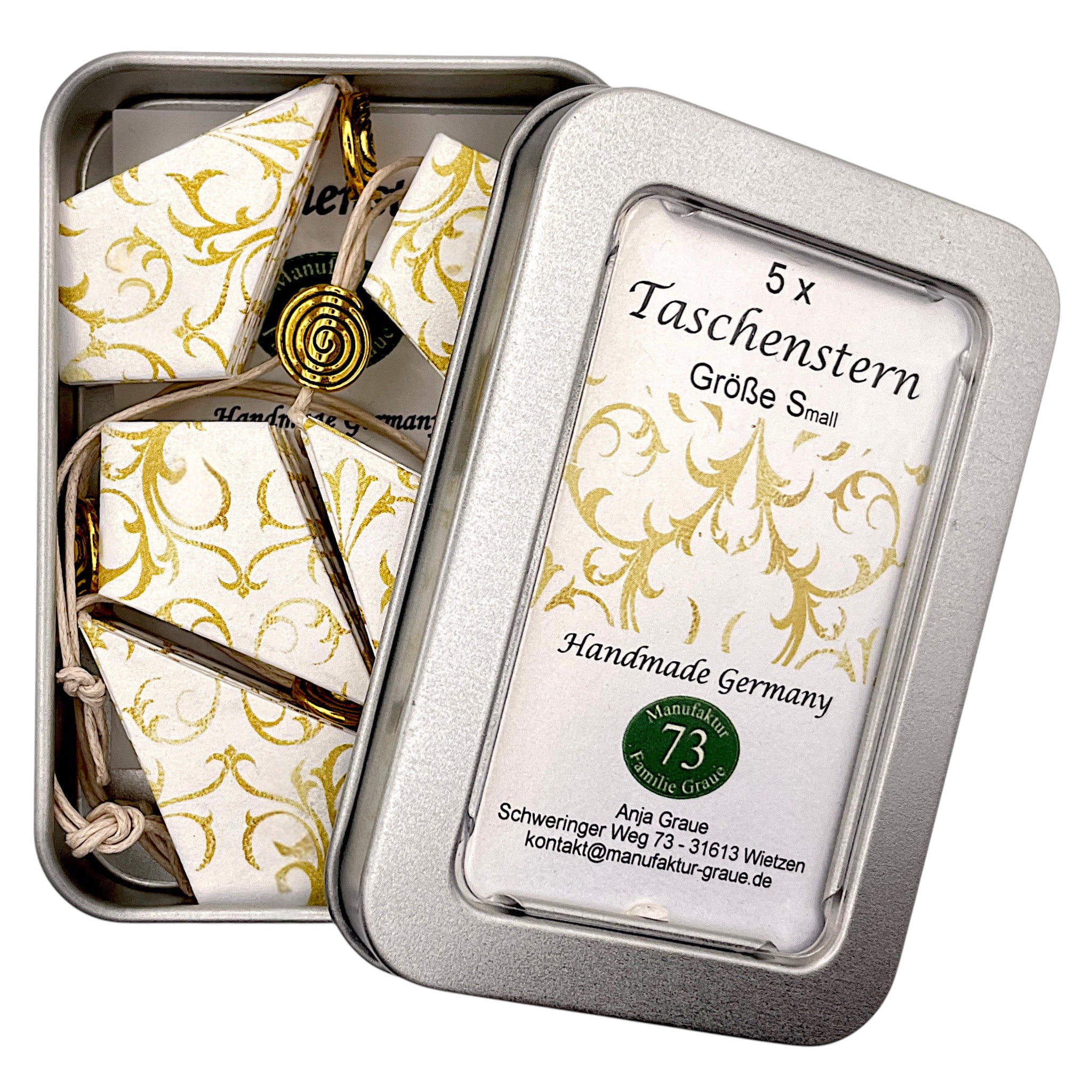 Papiersterne in gold mit weiß als Handarbeit
