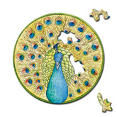 Rundes Curiosi Picoli Puzzle „Pfau“ mit kunstvollem Aquarellmotiv und 33 einzigartigen Puzzleteilen.