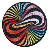 Rundes Curiosi Picoli Puzzle „Lolly“ mit farbenfrohem Aquarellmotiv und 33 einzigartigen Puzzleteilen.