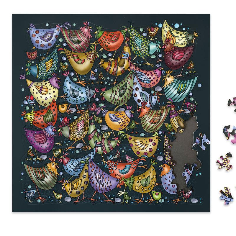 Curiosi Puzzle „Hühnerhaufen“ inklusive praktischer Legeplatte als Puzzleunterlage.