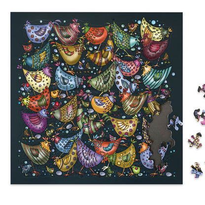 Curiosi Puzzle „Hühnerhaufen“ inklusive praktischer Legeplatte als Puzzleunterlage.