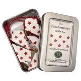Papierstern Mini Goldweiß-Rot in geöffneter Schmuckdose mit fünf handgefalteten Mini-Taschensternen