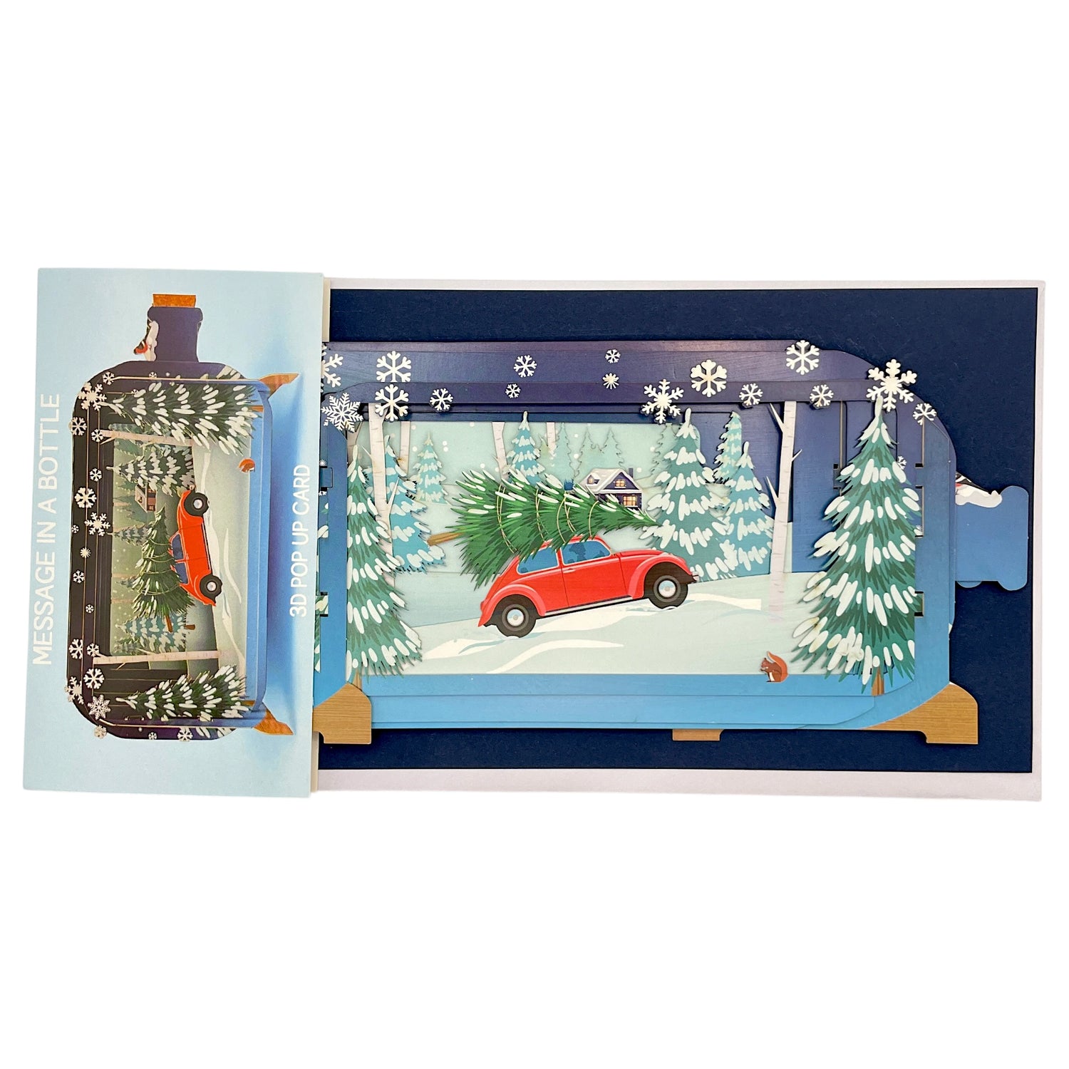 Weihnachtskarte als 3D Pop-up mit rotem Auto und Tannenbaum in verschneiter Landschaft.